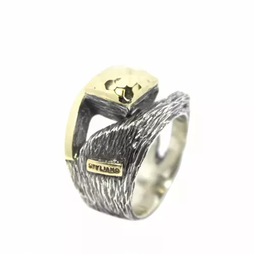 Anillo en plata de ley 925 y oro 9k.